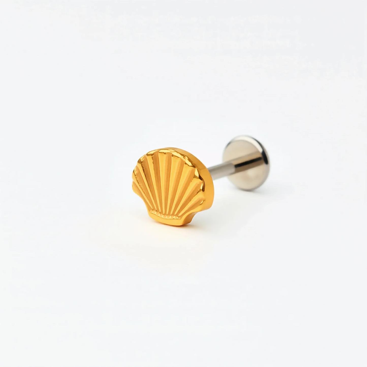 Single Titanium Shell Crest flat back stud earring with a gold finish. Front and side view showing the shell design and hypoallergenic implant-grade titanium push-in post and flat back.