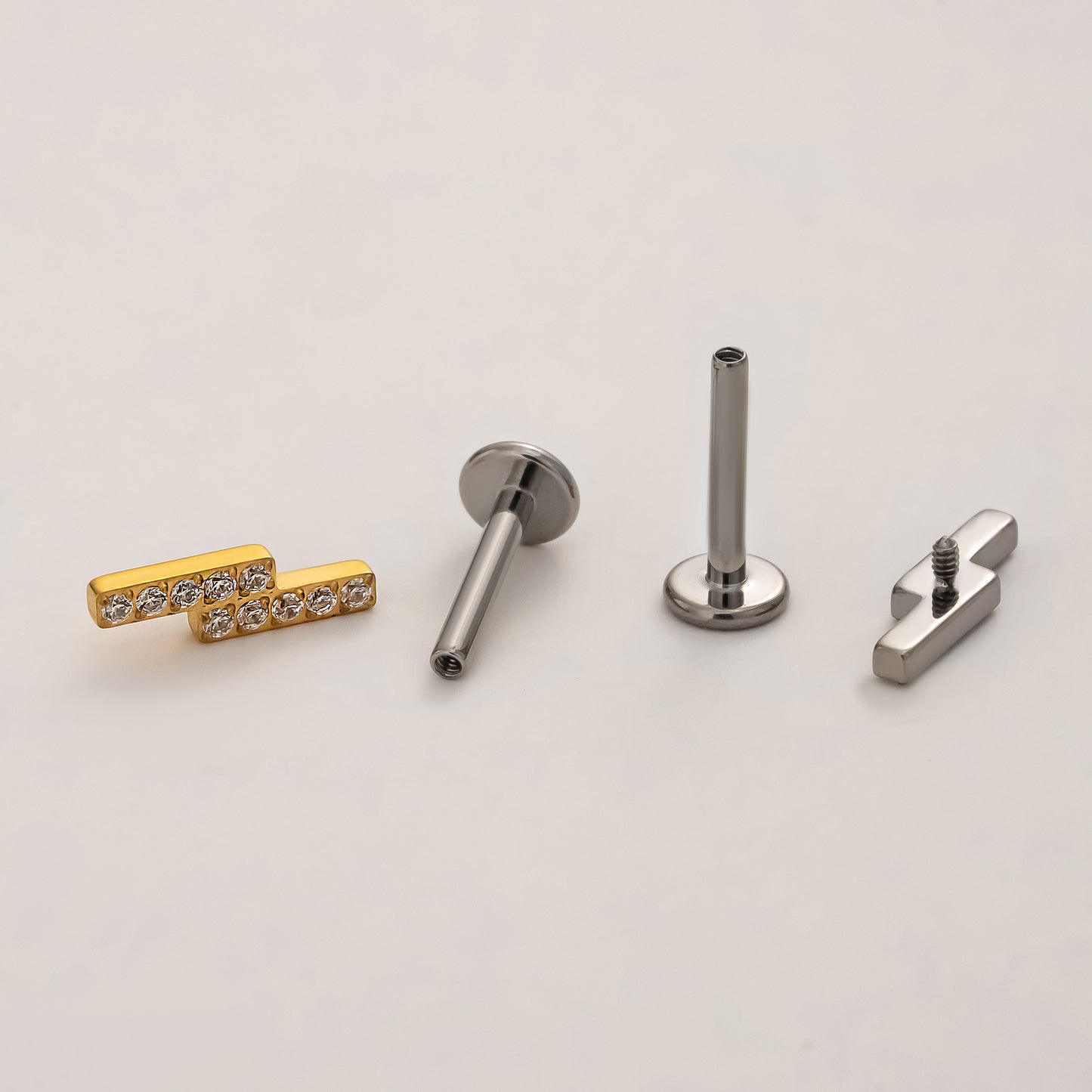 Front and back view of twin bar titanium flat back earrings with implant-grade titanium threaded posts
