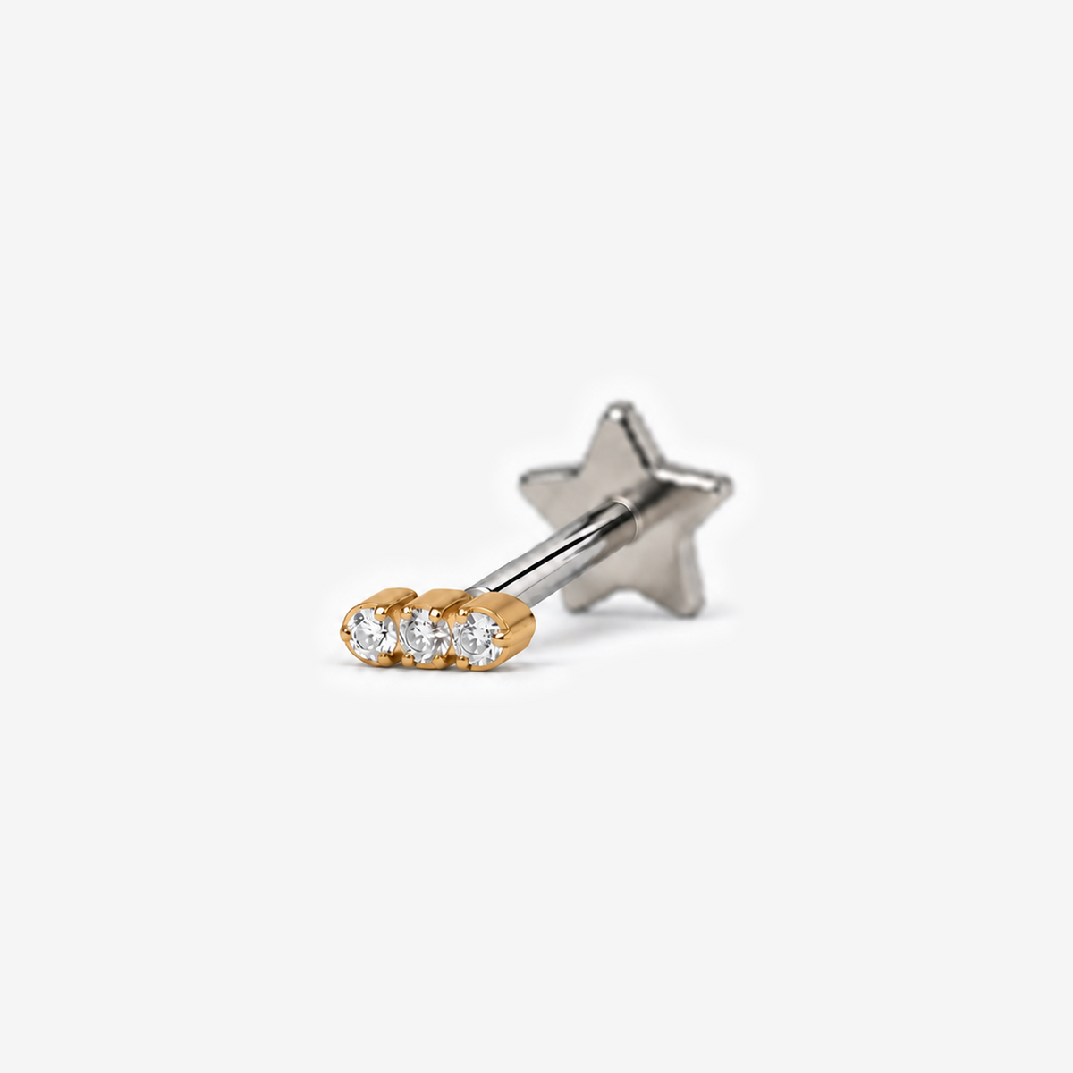 Mini Trio flat back earring in gold, angled view