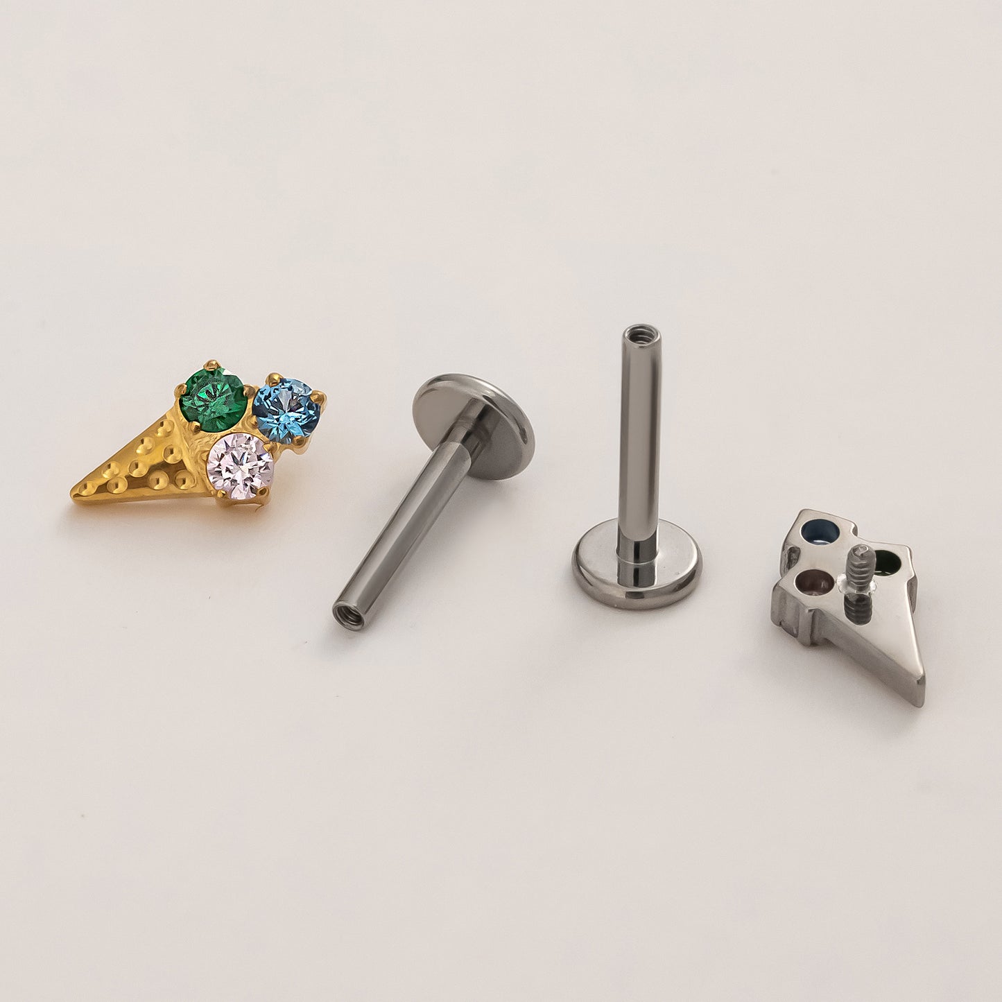 Front and back view of triple treat titanium flat back earrings with implant-grade titanium threaded posts