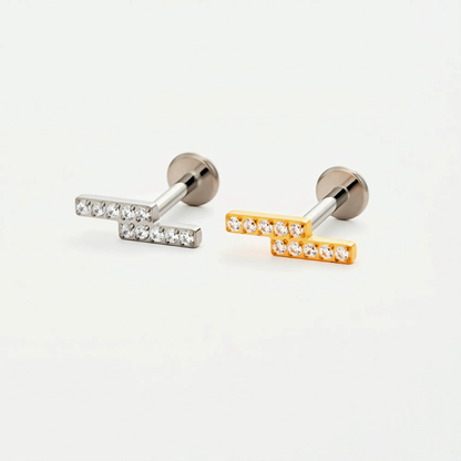 Titanium Twin Bar internally threaded flat back stud earrings in natural titanium and gold, featuring a minimalist double-bar design. Hypoallergenic implant-grade titanium studs on a white background.