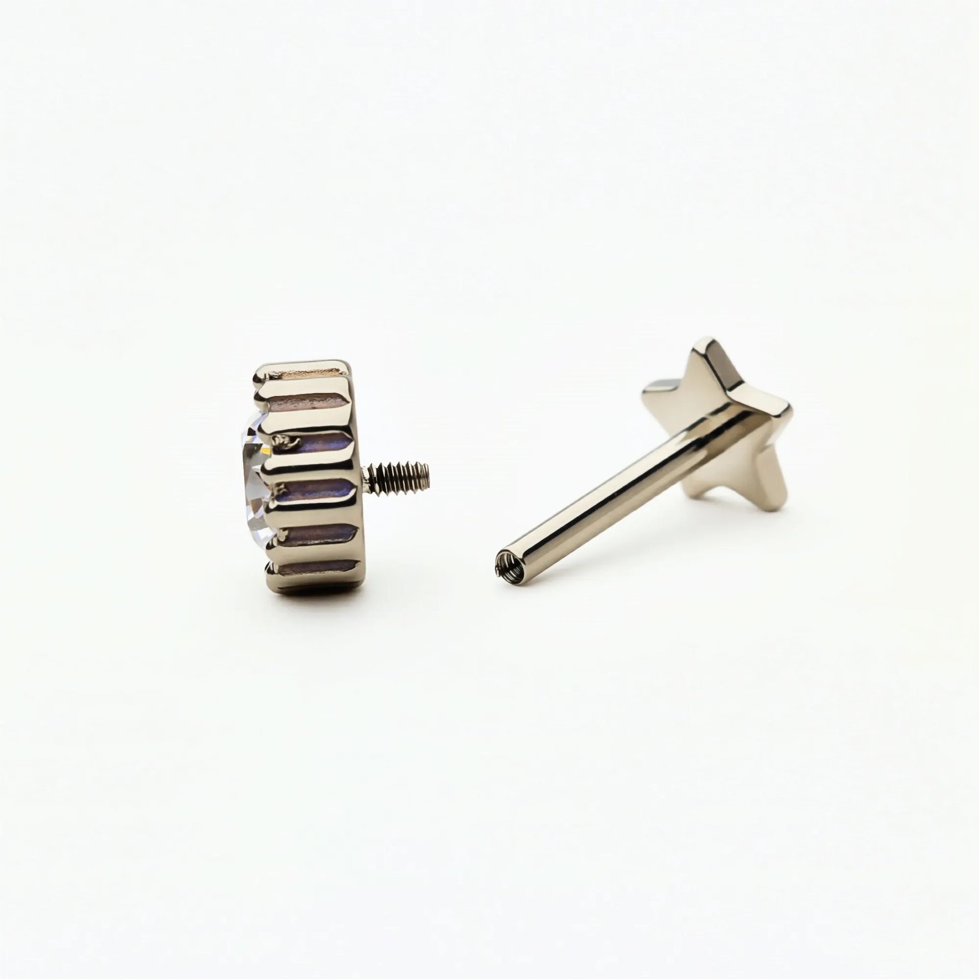 Back and post view of the Titanium Crown Spark internally threaded flat back stud earring, showing the implant-grade titanium internal threading and smooth flat back.