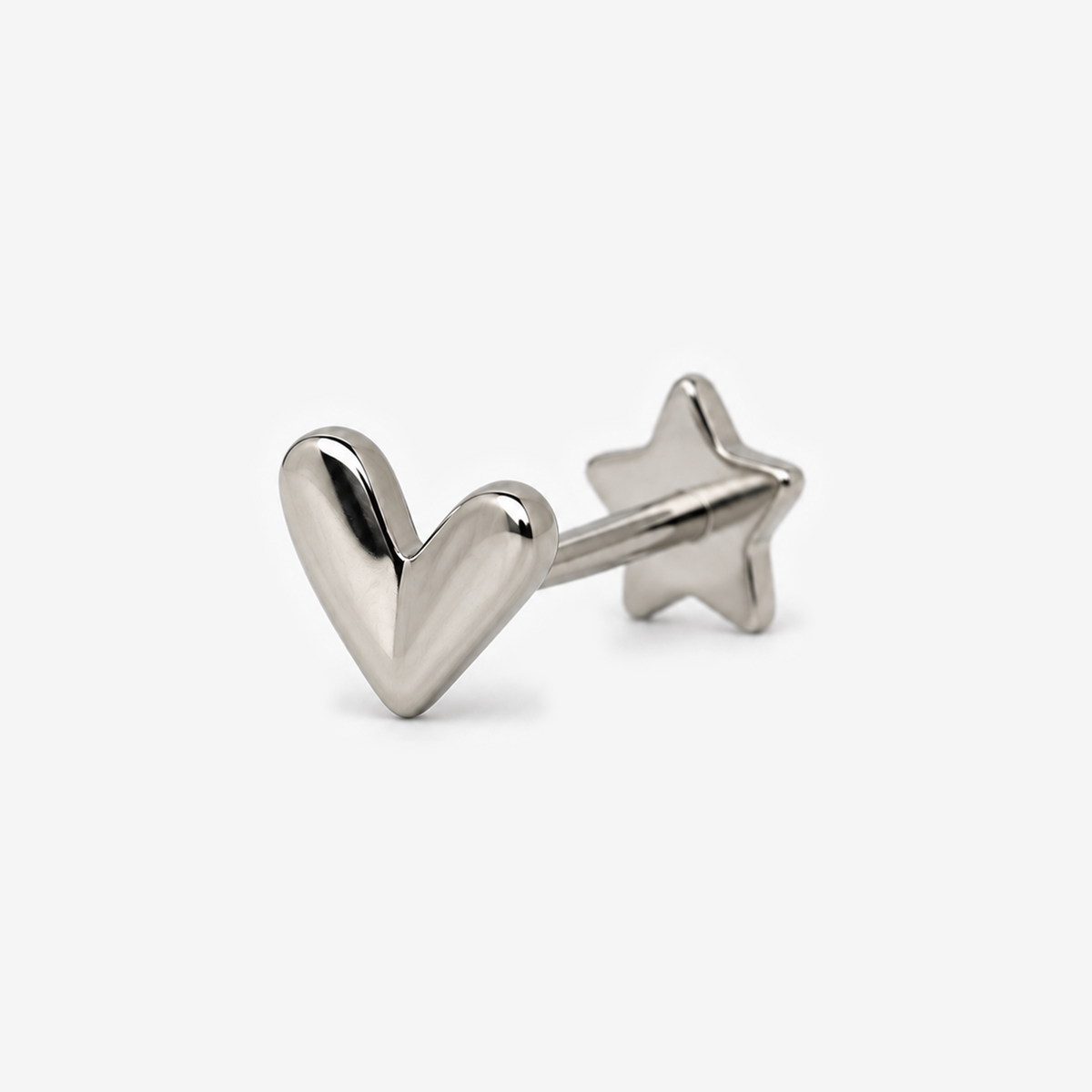 Candy Heart flat back earring in titanium, angled view