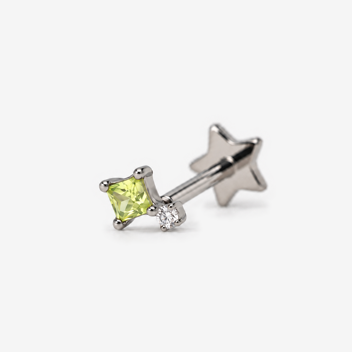Candy Pop titanium flat back earring with lime green stone, angled view