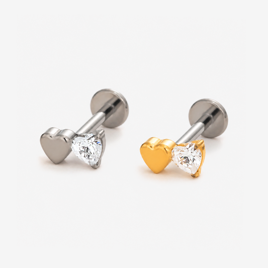 Duo Heart flat back stud earrings in titanium and gold.