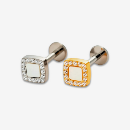Lumi Square flat back stud earrings in titanium and gold.