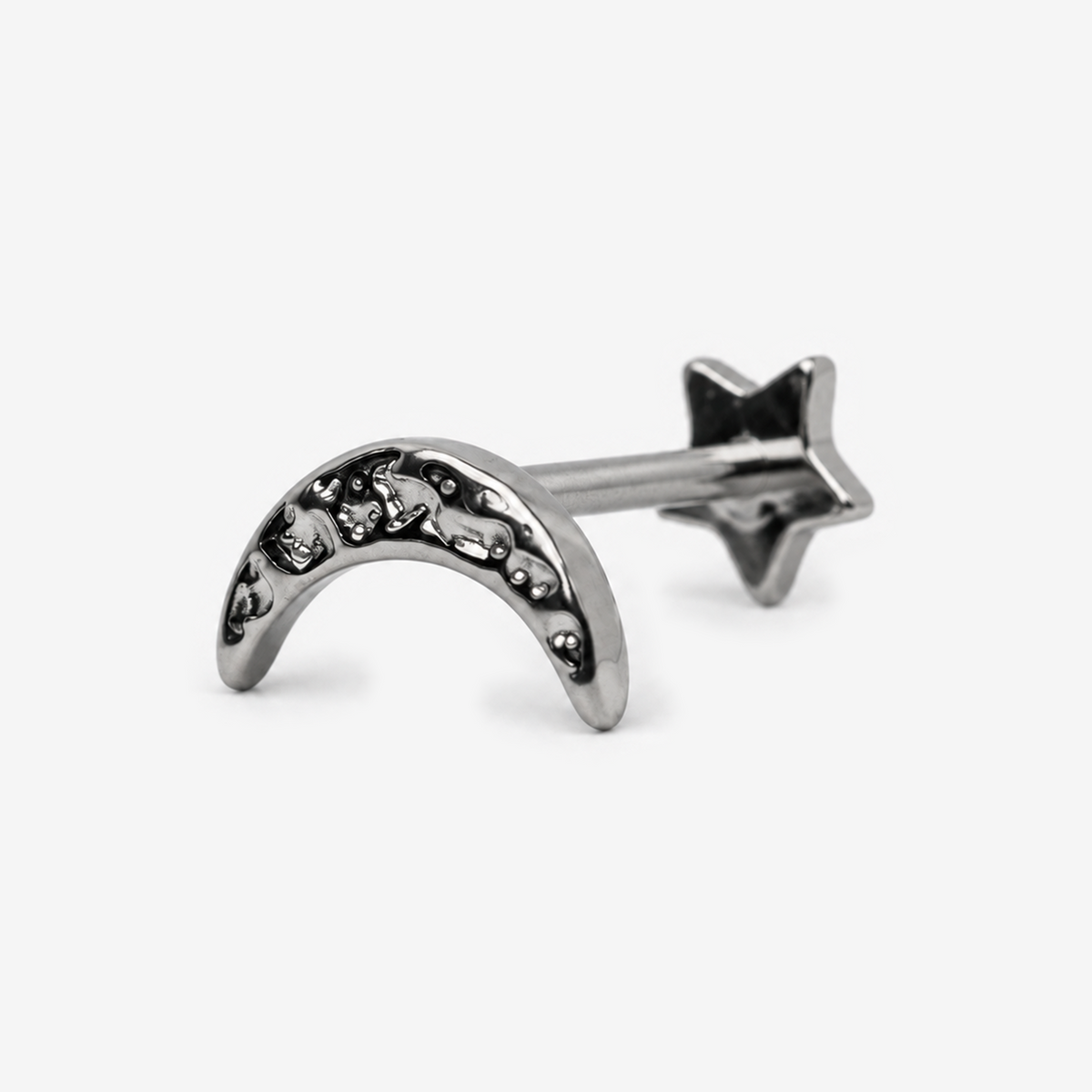 Lunar Crescent flat back earring in titanium, angled view