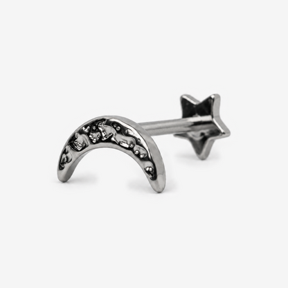 Lunar Crescent flat back earring in titanium, angled view