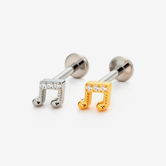 Melody flat back stud earrings in titanium and gold.