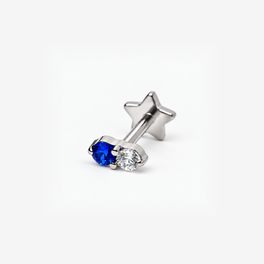 Moonlit blue and clear CZ titanium flat back earring, angled view