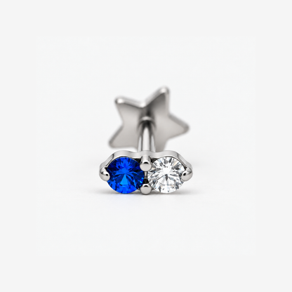 Moonlit blue and clear round cubic zirconia stones, front detail