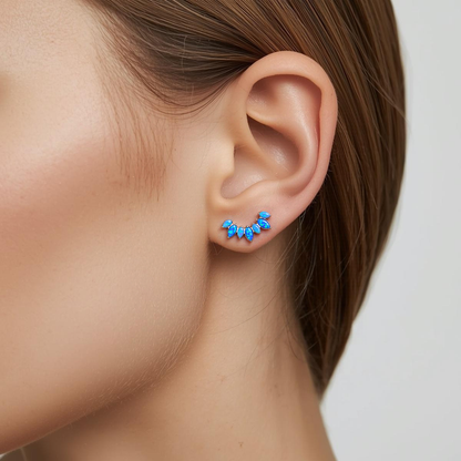 Opal Crown blue opal titanium earring worn on the earlobe