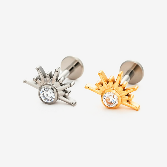 Sunbeam flat back stud earrings in titanium and gold.