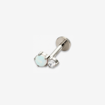 Twin Moonlight titanium flat back earring with a white opal and clear stone.